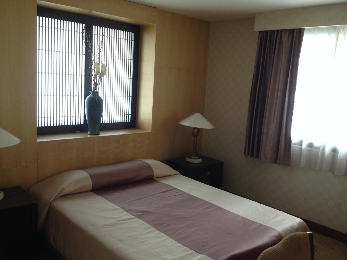 Gardengrove Suites 방콕 객실 사진